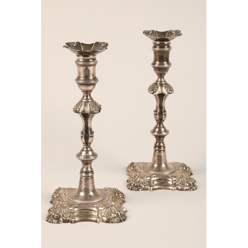 197 - Pair George II silver candle sticks, knopped baluster formed stems, raised on shaped square bases, a... 