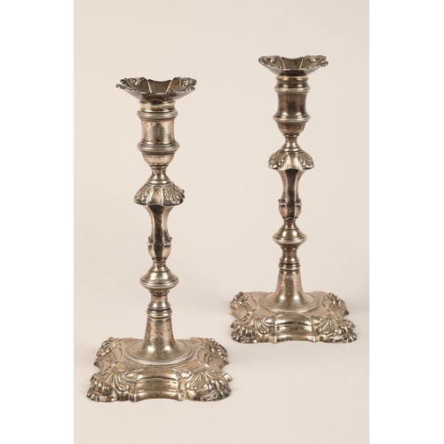 197 - Pair George II silver candle sticks, knopped baluster formed stems, raised on shaped square bases, a... 