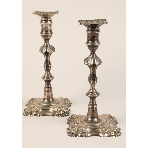 198 - Pair George II silver candlesticks, knopped baluster formed stems, raised on shaped square base, ass... 