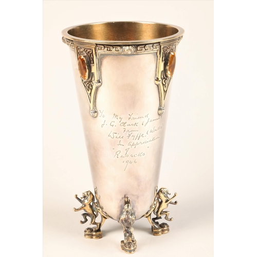 200 - Silver and silver gilt presentation vase, raised on four silver gilt lion rampant feet, celtic decor... 