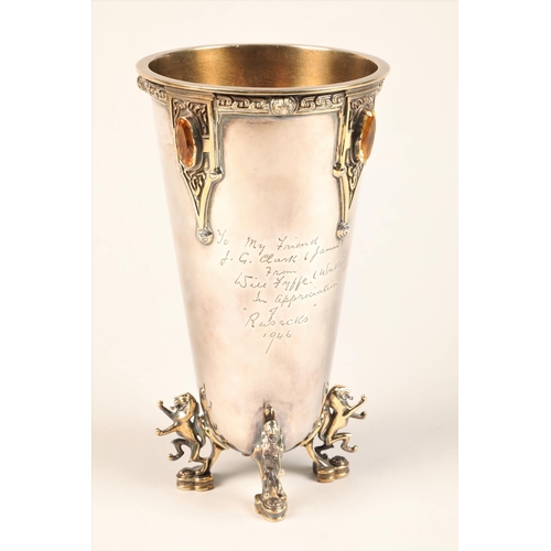 200 - Silver and silver gilt presentation vase, raised on four silver gilt lion rampant feet, celtic decor... 