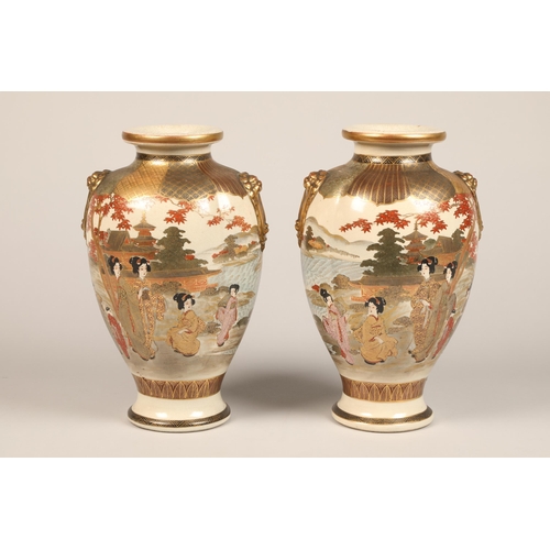 252 - Pair Japanese satsuma pottery vases, baluster form with twin gilt masks, decorated with a continuous... 