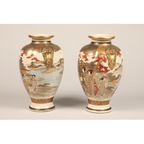 252 - Pair Japanese satsuma pottery vases, baluster form with twin gilt masks, decorated with a continuous... 