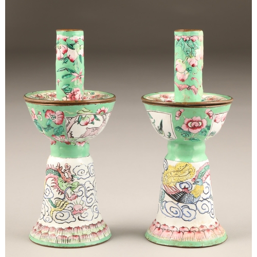 257 - Pair of Chinese canton enamel candlesticks, apple green and white enamelled ground decorated with dr... 