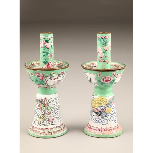 257 - Pair of Chinese canton enamel candlesticks, apple green and white enamelled ground decorated with dr... 