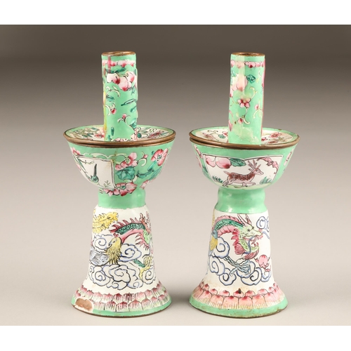 257 - Pair of Chinese canton enamel candlesticks, apple green and white enamelled ground decorated with dr... 