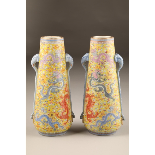 259 - Pair 20th century Chinese famille rose, yellow ground vases, tapered form with applied elephant mask... 