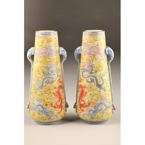 259 - Pair 20th century Chinese famille rose, yellow ground vases, tapered form with applied elephant mask... 