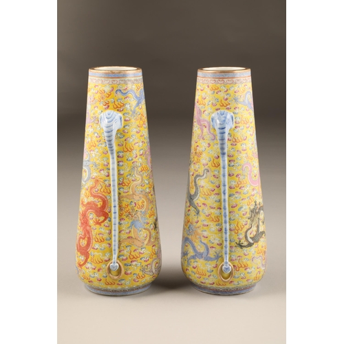 259 - Pair 20th century Chinese famille rose, yellow ground vases, tapered form with applied elephant mask... 