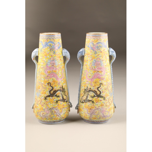 259 - Pair 20th century Chinese famille rose, yellow ground vases, tapered form with applied elephant mask... 