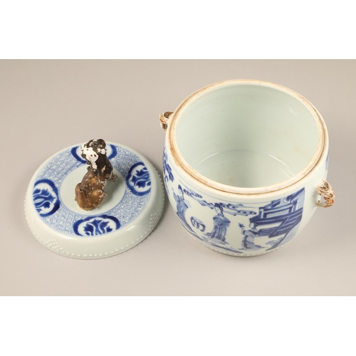 261 - 18th century Kang Hsi Chinese blue and white jar and cover, with twin gilt hoop handles and the cove... 