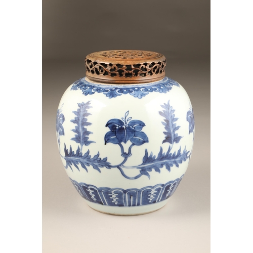 262 - 19th century Chinese blue and white ginger jar, with carved hardwood cover, the jar decorated with a... 