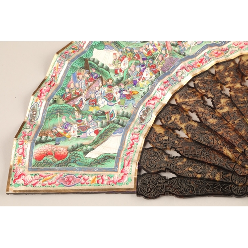 277 - 19th century Chinese folding Mandarin fan with carved tortoiseshell sticks. Fourteen leaves painted ... 