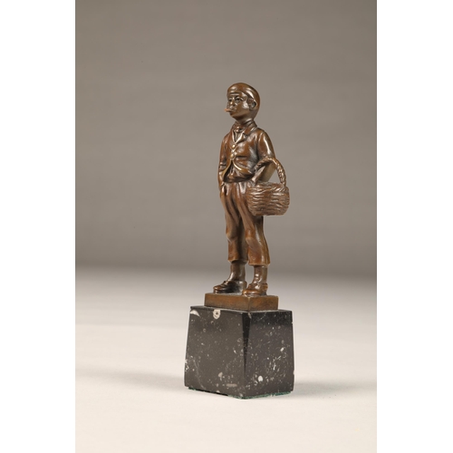 289 - EB Morty (German 20th century) bronze figure of a smoking boy with basket, height 16cm