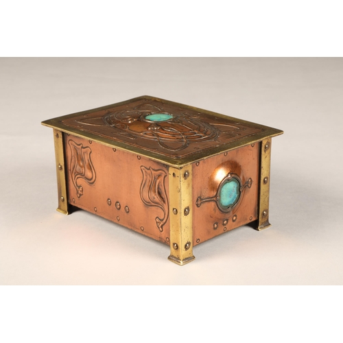 294 - McVitie and Paige arts and crafts brass and copper biscuit box with a lock and key, green velvet int... 