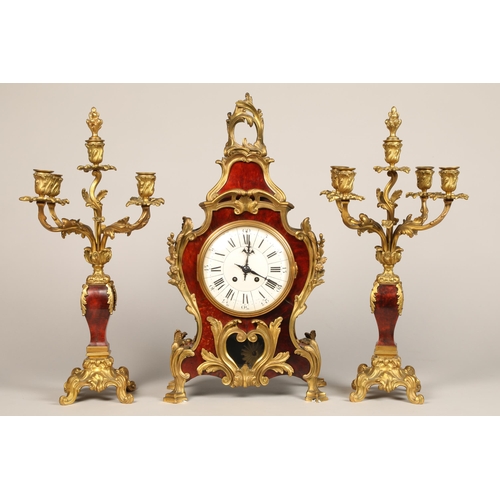 301 - 19th century French three piece tortoiseshell and ormolu mounted clock garniture, white enamel dial,... 