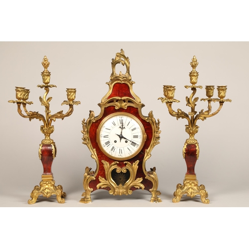 301 - 19th century French three piece tortoiseshell and ormolu mounted clock garniture, white enamel dial,... 