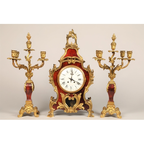 301 - 19th century French three piece tortoiseshell and ormolu mounted clock garniture, white enamel dial,... 