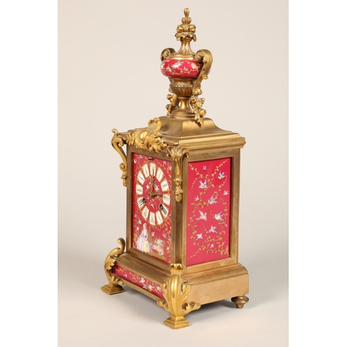 308 - 19th Century French three piece ormolu and porcelain clock set, the porcelain panels in pink decorat... 