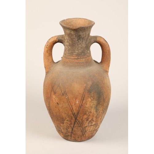 317 - Ancient terracotta pot with twin handles, Eastern possibly Egyptian, decorated with Geometric line d... 