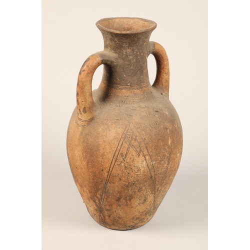 317 - Ancient terracotta pot with twin handles, Eastern possibly Egyptian, decorated with Geometric line d... 