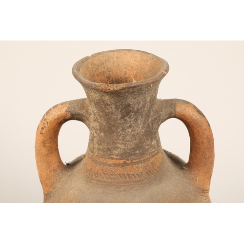 317 - Ancient terracotta pot with twin handles, Eastern possibly Egyptian, decorated with Geometric line d... 