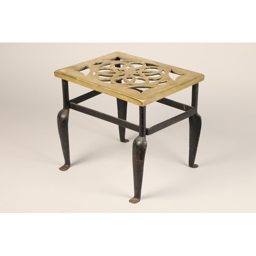 318 - Brass topped trivet stand, pierced rectangular brass top fixed to a wrought iron base, length 34cm, ... 