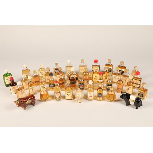 357 - Collection of eighty-nine whisky miniatures, two sets of The Malt encyclopaedia Beneagles ceramic mi... 