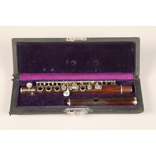 368 - A te Bonneville A Paris rosewood piccolo, 5008, length from embouchure 25.5cm, with silvered keys, i... 