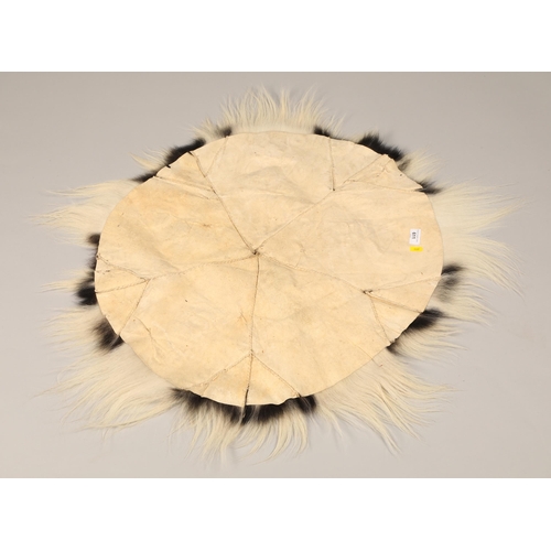 611 - Colobus monkey skin rug, diameter 90cm