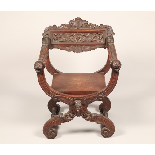 618 - Early twentieth century carved oak X framed chair with carved animal face masks, length 60cm, depth ... 