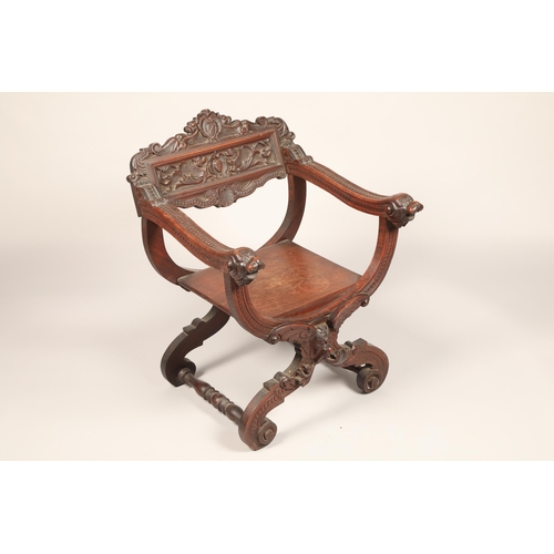 618 - Early twentieth century carved oak X framed chair with carved animal face masks, length 60cm, depth ... 