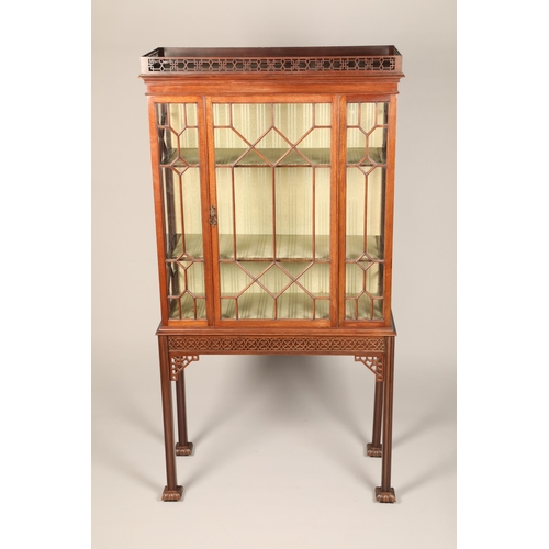 631 - Chippendale style mahogany display cabinet, fretwork gallery over an astragal glass cabinet with sin... 