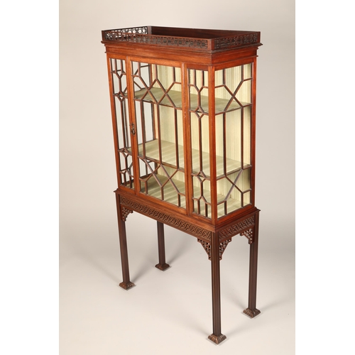 631 - Chippendale style mahogany display cabinet, fretwork gallery over an astragal glass cabinet with sin... 