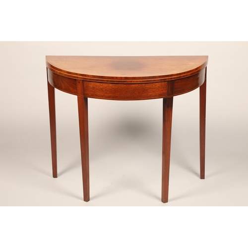 640 - Mahogany demi lune fold over tea table raised on square tapered legs, length 88cm, width 43cm, heigh... 