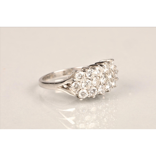 87 - Ladies 18ct white gold diamond cluster ring, set with three rows of small diamonds on an 18ct white ... 