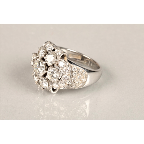 90 - Ladies 18ct white gold diamond cluster ring, central diamond brilliant cut 0.75 carat diamond, surro... 