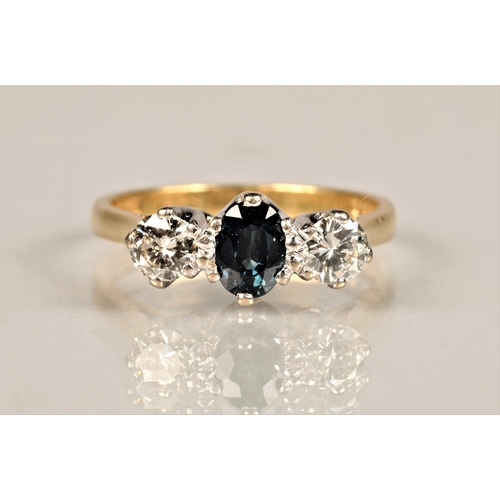 93 - Ladies diamond and sapphire ring, central sapphire with a 0.25 carat diamond on either side set on a... 