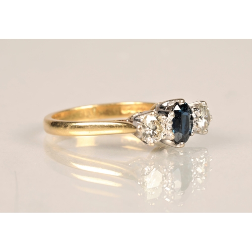 93 - Ladies diamond and sapphire ring, central sapphire with a 0.25 carat diamond on either side set on a... 