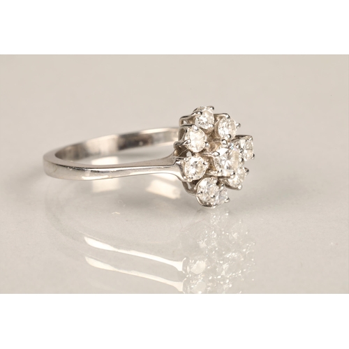 99 - Ladies 18ct white gold diamond cluster ring, central stone 0.2 carat surrounded by eight 0.1 carat d... 