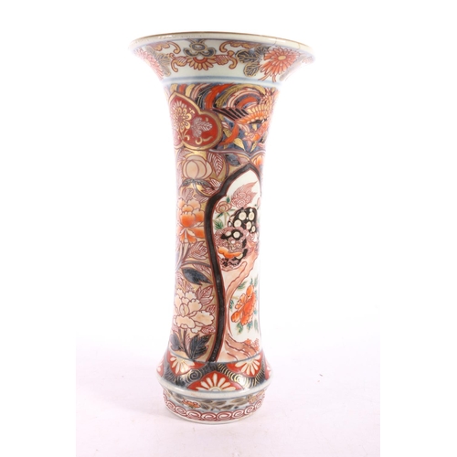 140 - 18th century Imari vase with flaring trumpet lip, 22cm high. (a/f). #60