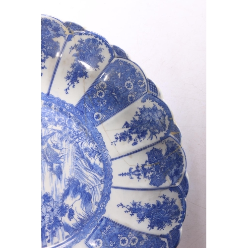 142 - Japanese porcelain blue and white bowl (repaired), 32cm diameter. #65