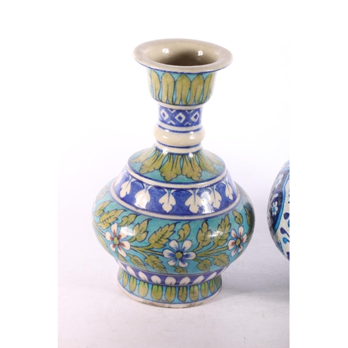 156 - Two Persian Iznik style pottery vases, 28cm and 23cm high.  (a/f)  #219