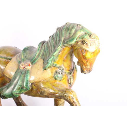 158 - Two reproduction Tang style pottery horses, yellow and green glazed, 30cm and 26cm high. #234 (a/f)