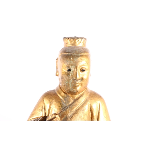 167 - Chinese gilded wooden figure of Buddha, 36cm high. #359