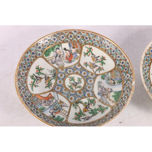 206 - Pair of Chinese Canton porcelain cups and saucers decorated with figures and birds in trees. (2) #59... 