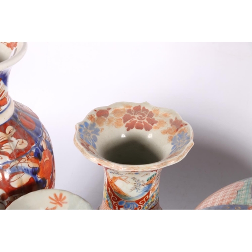 217 - Chinese Imari porcelain to include a lidded pot and cover, 25cm diameter, five vases, the largest 30... 