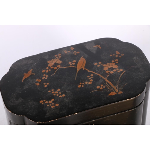 226 - Japanned black lacquered tea caddy decorated with birds on flowering branches, having two division i... 