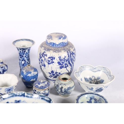 232 - Chinese and Japanese blue and white porcelain to include a set of three oval lobed dishes, 17cm long... 