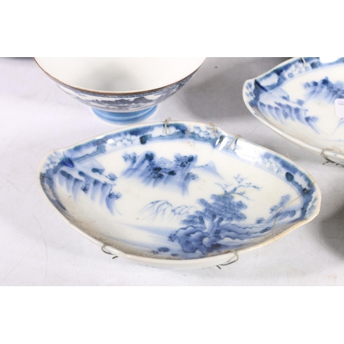 232 - Chinese and Japanese blue and white porcelain to include a set of three oval lobed dishes, 17cm long... 